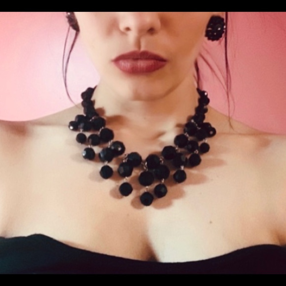 Black beaded necklace with matching earrings